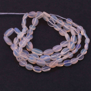 1 Long Strand Opal  Smooth Oval Shape Briolettes  - Smooth Briolettes  7mmx4mm-4mmx2mm -16 Inches  BR4240 - Tucson Beads